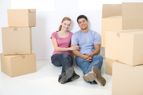 Professional team handling furniture pick-up in Putney storage