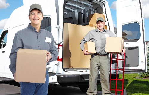 Friendly staff assisting customers at Putney Storage